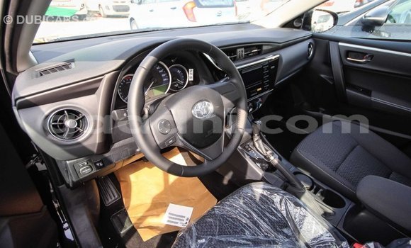 Imported Toyota Corolla Black Makiinaa iti Import - Dubai keessatti Somalia keessatti Imported Toyota Corolla Black Makiinaa iti Import - Dubai keessatti Somalia keessatti