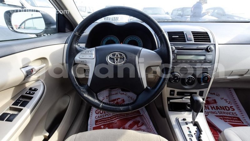 Big with watermark toyota corolla somalia import dubai 3032