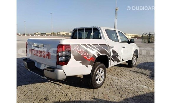 Buy Import Mitsubishi L200 White Car in Import - Dubai in Somalia Buy Import Mitsubishi L200 White Car in Import - Dubai in Somalia