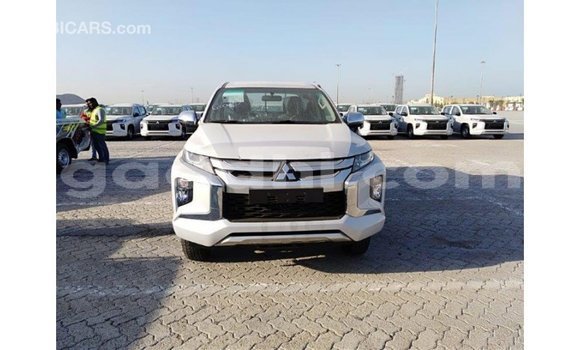 Buy Import Mitsubishi L200 White Car in Import - Dubai in Somalia Buy Import Mitsubishi L200 White Car in Import - Dubai in Somalia