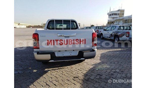 Buy Import Mitsubishi L200 White Car in Import - Dubai in Somalia Buy Import Mitsubishi L200 White Car in Import - Dubai in Somalia