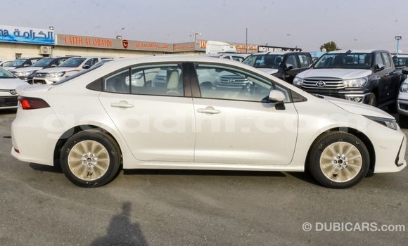 Buy Import Toyota Corolla White Car in Import - Dubai in Somalia Buy Import Toyota Corolla White Car in Import - Dubai in Somalia