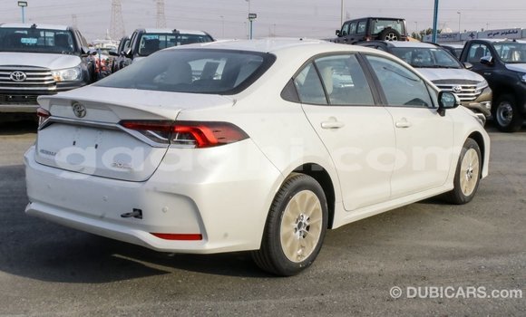 Buy Import Toyota Corolla White Car in Import - Dubai in Somalia Buy Import Toyota Corolla White Car in Import - Dubai in Somalia