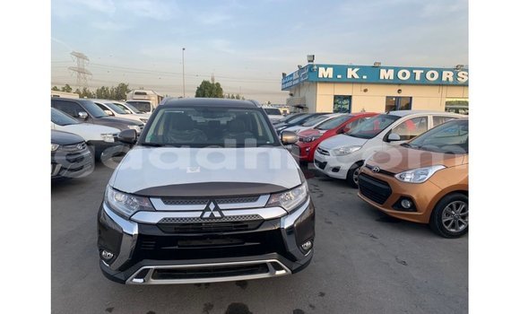 Imported Mitsubishi Outlander Brown Makiinaa iti Import - Dubai keessatti Somalia keessatti Imported Mitsubishi Outlander Brown Makiinaa iti Import - Dubai keessatti Somalia keessatti