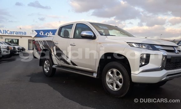 Buy Import Mitsubishi L200 White Car in Import - Dubai in Somalia Buy Import Mitsubishi L200 White Car in Import - Dubai in Somalia
