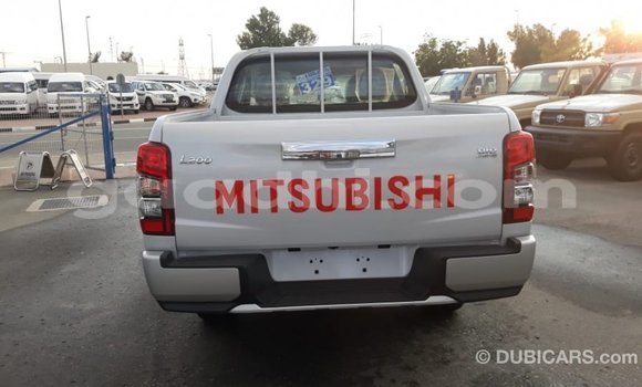 Buy Import Mitsubishi L200 White Car in Import - Dubai in Somalia Buy Import Mitsubishi L200 White Car in Import - Dubai in Somalia