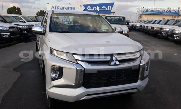 Buy Import Mitsubishi L200 White Car in Import - Dubai in Somalia Buy Import Mitsubishi L200 White Car in Import - Dubai in Somalia