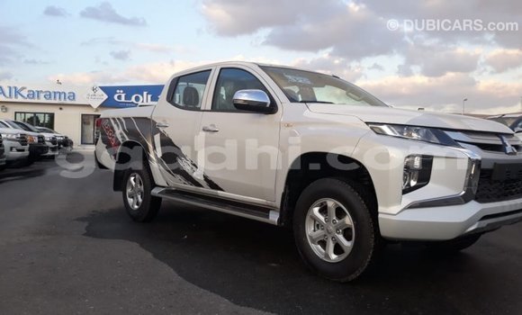 Buy Import Mitsubishi L200 White Car in Import - Dubai in Somalia Buy Import Mitsubishi L200 White Car in Import - Dubai in Somalia