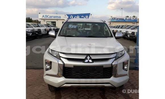 Buy Import Mitsubishi L200 White Car in Import - Dubai in Somalia Buy Import Mitsubishi L200 White Car in Import - Dubai in Somalia