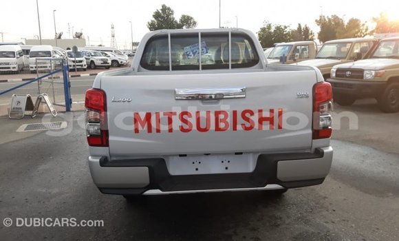 Buy Import Mitsubishi L200 White Car in Import - Dubai in Somalia Buy Import Mitsubishi L200 White Car in Import - Dubai in Somalia