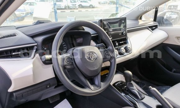 Buy Import Toyota Corolla White Car in Import - Dubai in Somalia Buy Import Toyota Corolla White Car in Import - Dubai in Somalia