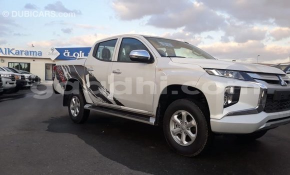 Buy Import Mitsubishi L200 White Car in Import - Dubai in Somalia Buy Import Mitsubishi L200 White Car in Import - Dubai in Somalia