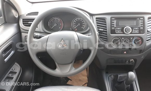 Buy Import Mitsubishi L200 White Car in Import - Dubai in Somalia Buy Import Mitsubishi L200 White Car in Import - Dubai in Somalia