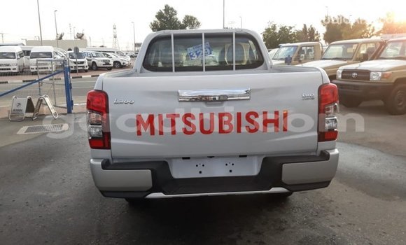 Buy Import Mitsubishi L200 White Car in Import - Dubai in Somalia Buy Import Mitsubishi L200 White Car in Import - Dubai in Somalia