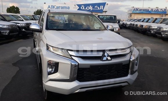 Buy Import Mitsubishi L200 White Car in Import - Dubai in Somalia Buy Import Mitsubishi L200 White Car in Import - Dubai in Somalia