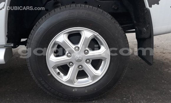 Buy Import Mitsubishi L200 White Car in Import - Dubai in Somalia Buy Import Mitsubishi L200 White Car in Import - Dubai in Somalia