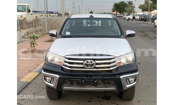 Nunua Imported Toyota Hilux Nyeusi Gari ndani ya Import - Dubai nchini Somalia Nunua Imported Toyota Hilux Nyeusi Gari ndani ya Import - Dubai nchini Somalia