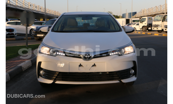 Buy Import Toyota Corolla White Car in Import - Dubai in Somalia Buy Import Toyota Corolla White Car in Import - Dubai in Somalia