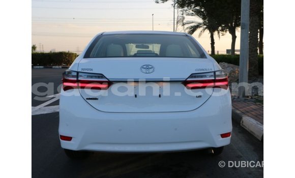 Buy Import Toyota Corolla White Car in Import - Dubai in Somalia Buy Import Toyota Corolla White Car in Import - Dubai in Somalia