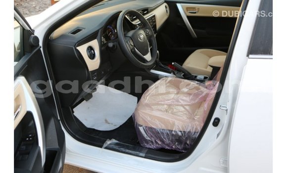 Buy Import Toyota Corolla White Car in Import - Dubai in Somalia Buy Import Toyota Corolla White Car in Import - Dubai in Somalia
