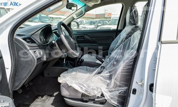 Buy Import Mitsubishi L200 White Car in Import - Dubai in Somalia Buy Import Mitsubishi L200 White Car in Import - Dubai in Somalia