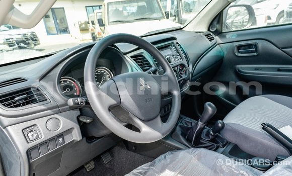 Buy Import Mitsubishi L200 White Car in Import - Dubai in Somalia Buy Import Mitsubishi L200 White Car in Import - Dubai in Somalia