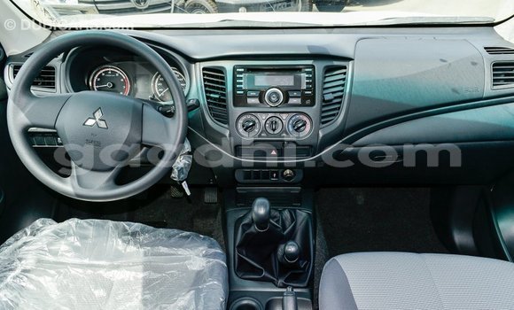 Buy Import Mitsubishi L200 White Car in Import - Dubai in Somalia Buy Import Mitsubishi L200 White Car in Import - Dubai in Somalia