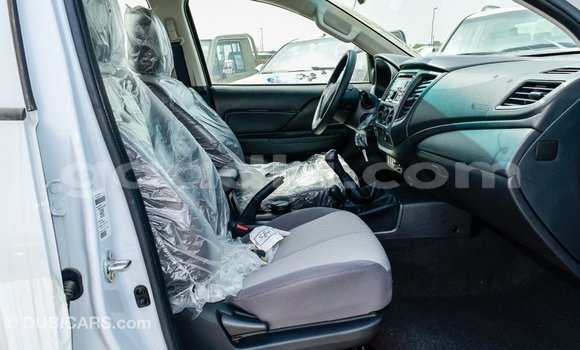 Buy Import Mitsubishi L200 White Car in Import - Dubai in Somalia Buy Import Mitsubishi L200 White Car in Import - Dubai in Somalia