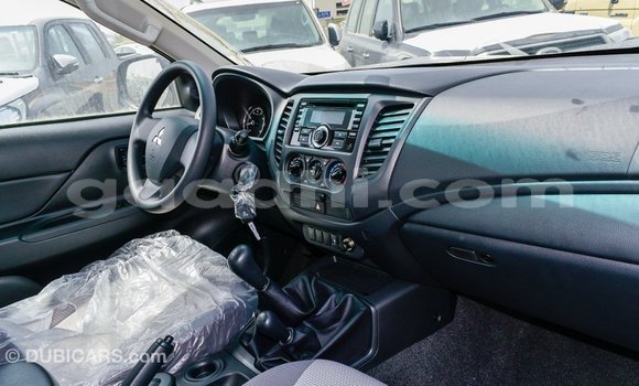 Buy Import Mitsubishi L200 White Car in Import - Dubai in Somalia Buy Import Mitsubishi L200 White Car in Import - Dubai in Somalia