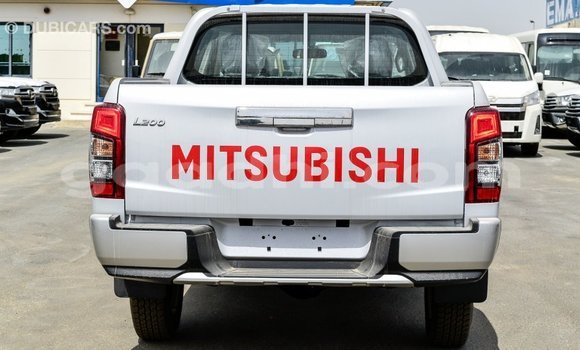 Buy Import Mitsubishi L200 White Car in Import - Dubai in Somalia Buy Import Mitsubishi L200 White Car in Import - Dubai in Somalia