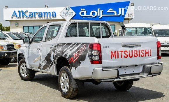 Buy Import Mitsubishi L200 White Car in Import - Dubai in Somalia Buy Import Mitsubishi L200 White Car in Import - Dubai in Somalia