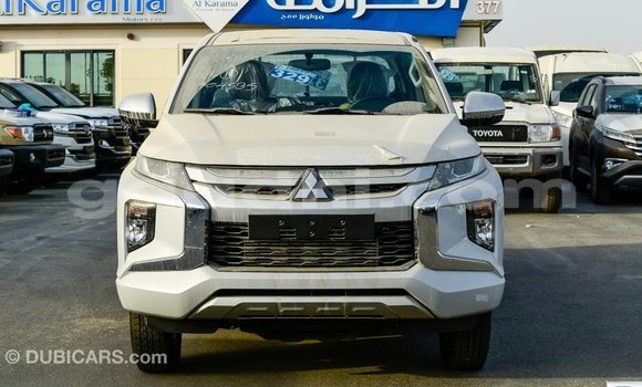 Buy Import Mitsubishi L200 White Car in Import - Dubai in Somalia Buy Import Mitsubishi L200 White Car in Import - Dubai in Somalia