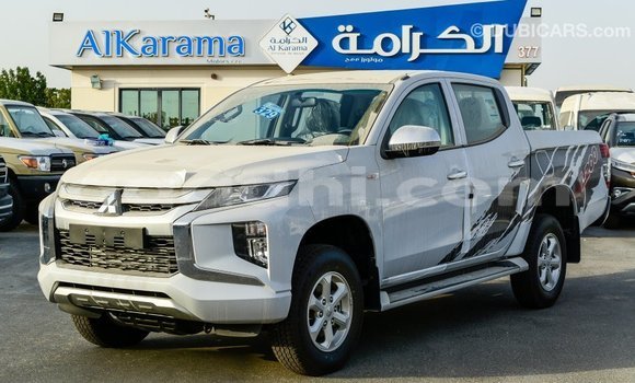 Buy Import Mitsubishi L200 White Car in Import - Dubai in Somalia Buy Import Mitsubishi L200 White Car in Import - Dubai in Somalia