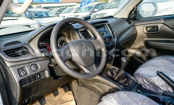 Buy Import Mitsubishi L200 White Car in Import - Dubai in Somalia Buy Import Mitsubishi L200 White Car in Import - Dubai in Somalia