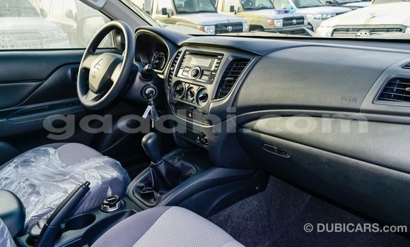 Buy Import Mitsubishi L200 White Car in Import - Dubai in Somalia Buy Import Mitsubishi L200 White Car in Import - Dubai in Somalia