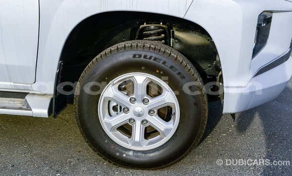 Buy Import Mitsubishi L200 White Car in Import - Dubai in Somalia Buy Import Mitsubishi L200 White Car in Import - Dubai in Somalia
