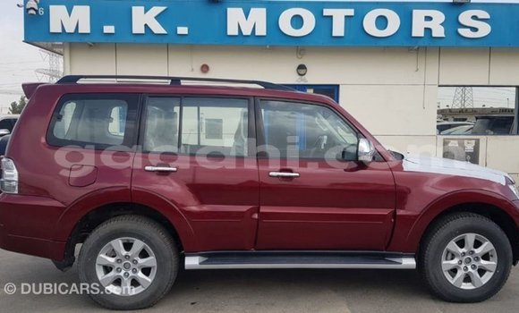 Imported Mitsubishi Pajero Red Makiinaa iti Import - Dubai keessatti Somalia keessatti Imported Mitsubishi Pajero Red Makiinaa iti Import - Dubai keessatti Somalia keessatti