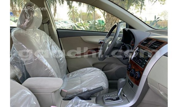 Buy Import Toyota Corolla White Car in Import - Dubai in Somalia Buy Import Toyota Corolla White Car in Import - Dubai in Somalia