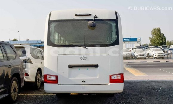 Acheter Import Voiture Toyota Coaster Blanc à Import - Dubai, Somalie Acheter Import Voiture Toyota Coaster Blanc à Import - Dubai, Somalie