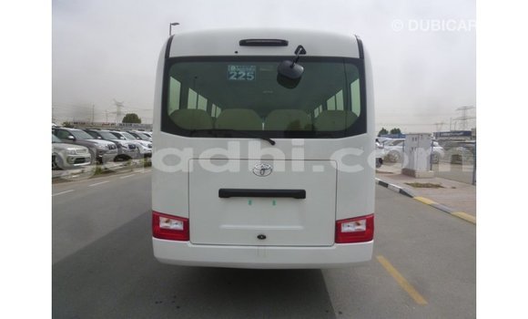 Acheter Import Voiture Toyota Coaster Blanc à Import - Dubai, Somalie Acheter Import Voiture Toyota Coaster Blanc à Import - Dubai, Somalie